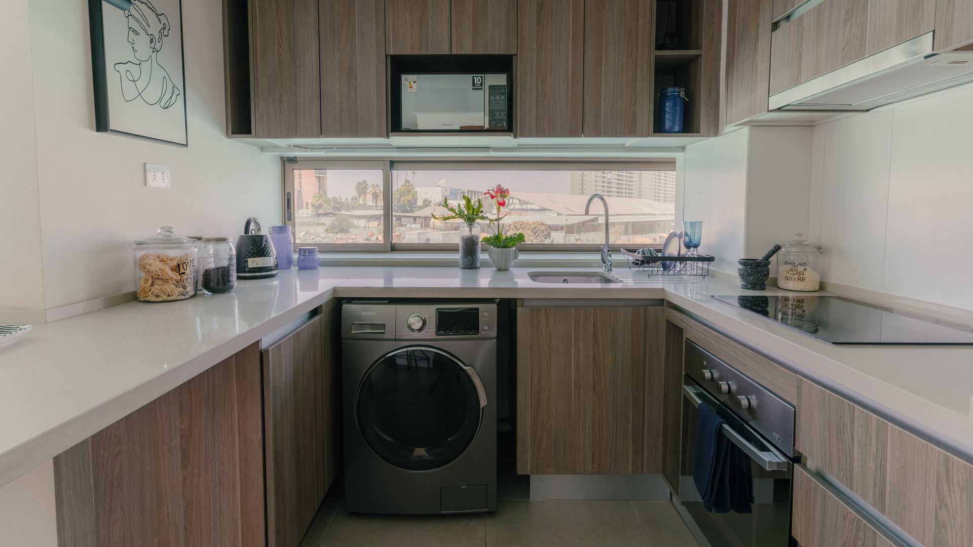 Cocina de un departamento en Laguna Centro, con lavadora
