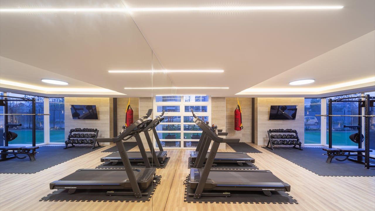Gimnasio con trotadoras de Activa Walker Martínez