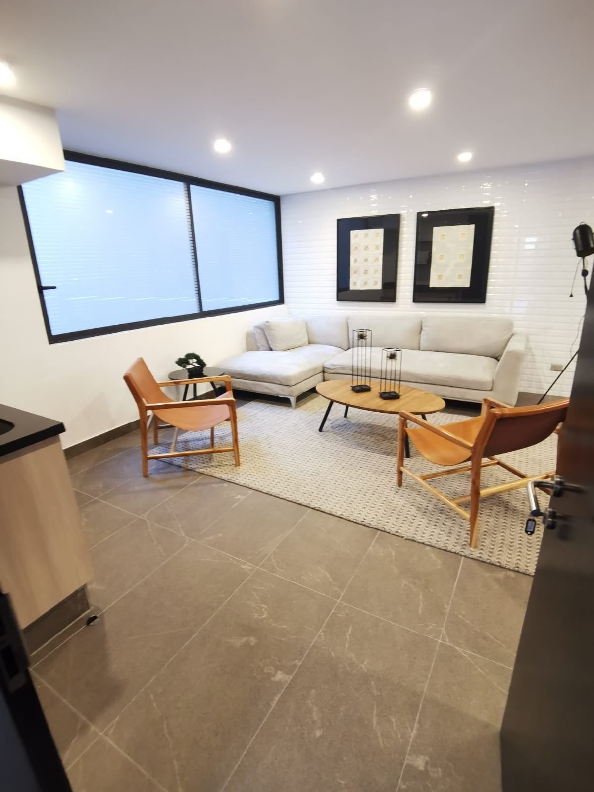 Sala común con sillones de Edificio Vergara